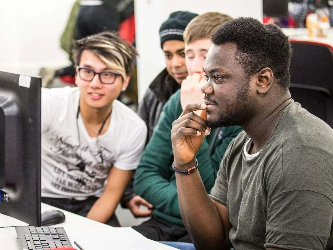 people around a computer