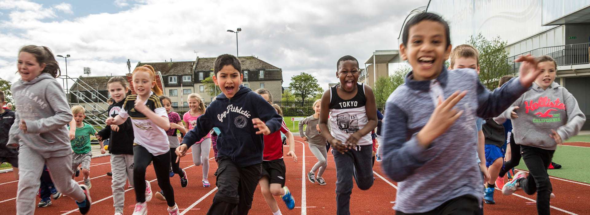 kids running on a track