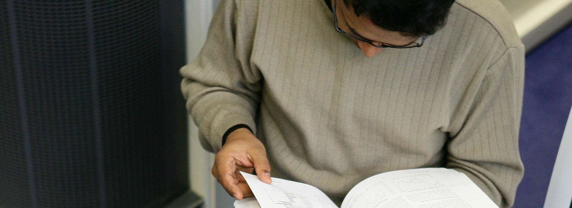 man reading a document