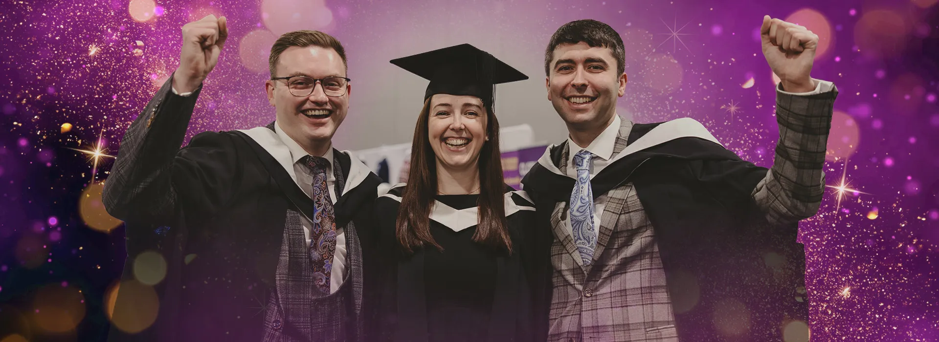 3 graduates celebrating at P&J Live