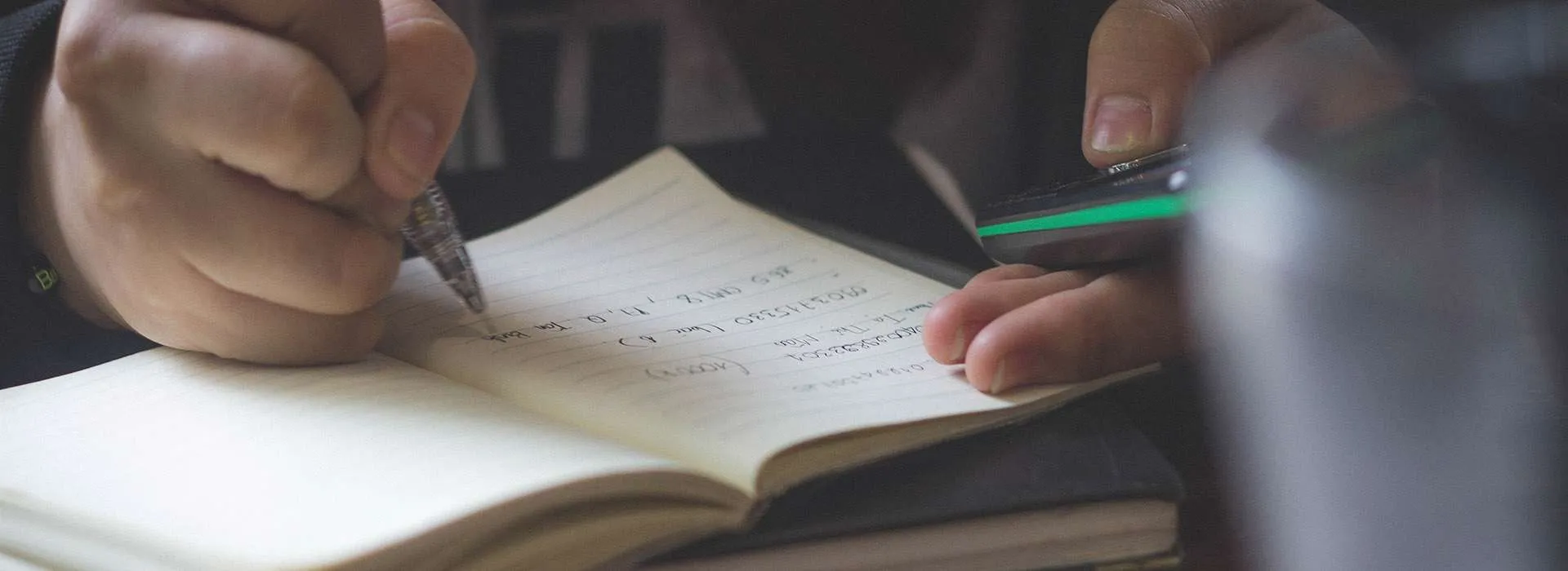 writing in notebook