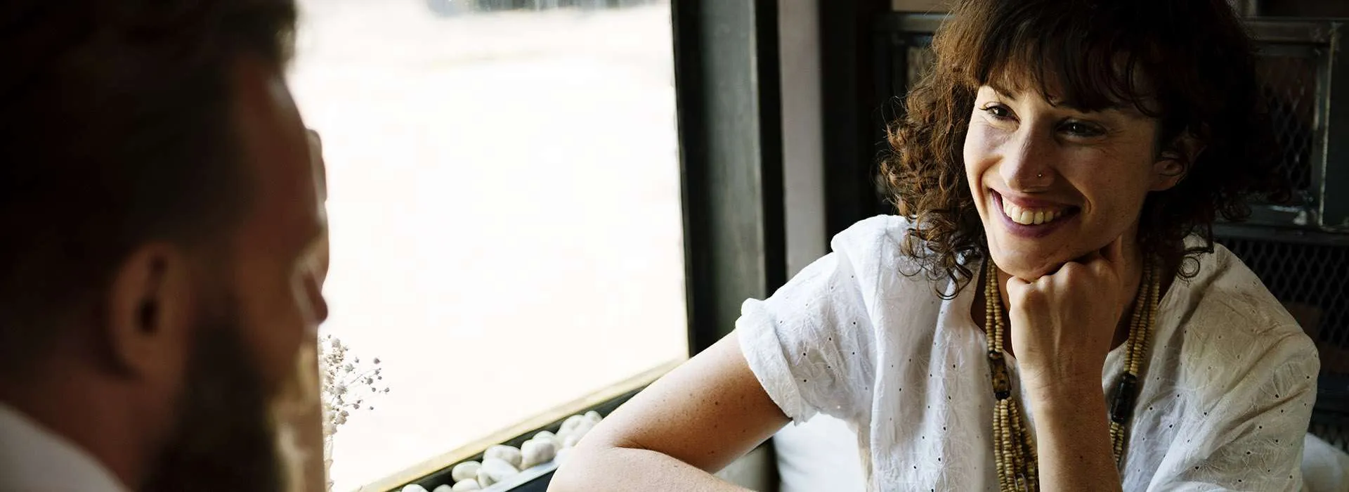 people smiling at one another