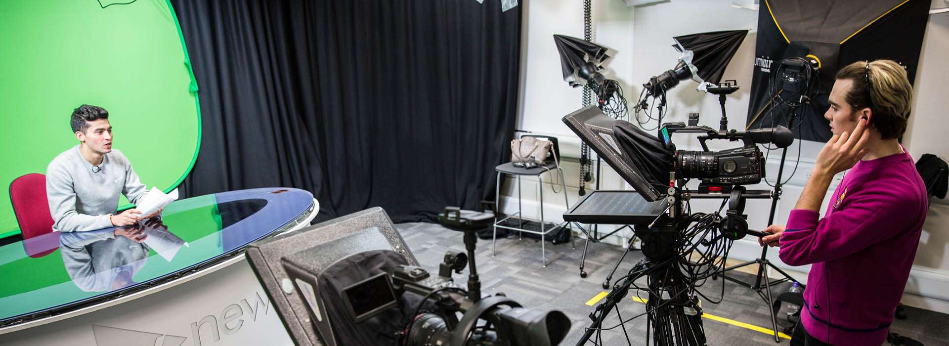 students recording in TV studio