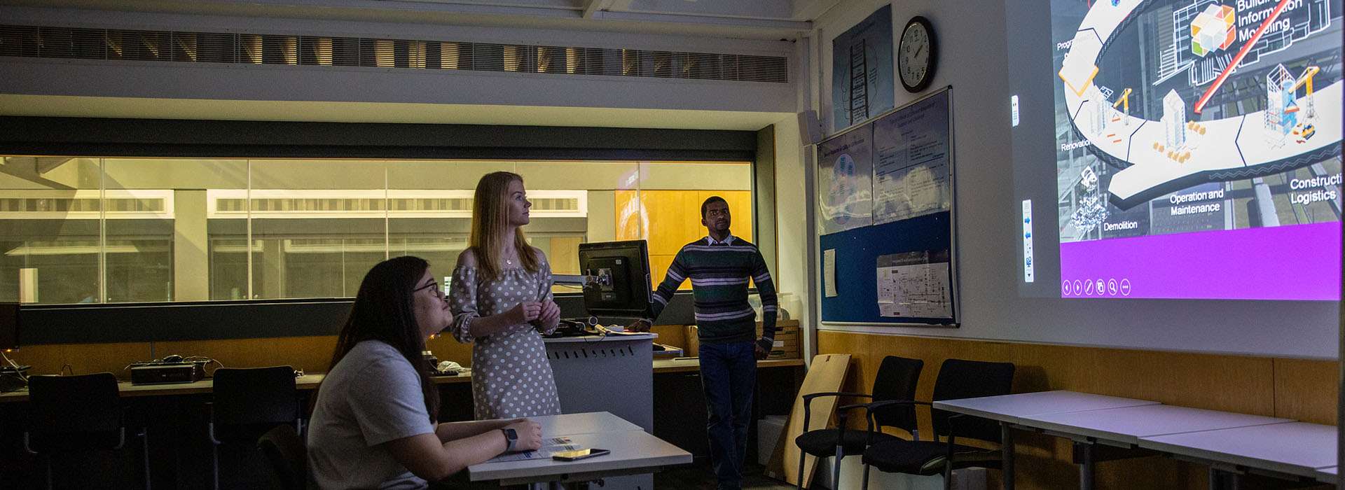 students looking intently at a presentation
