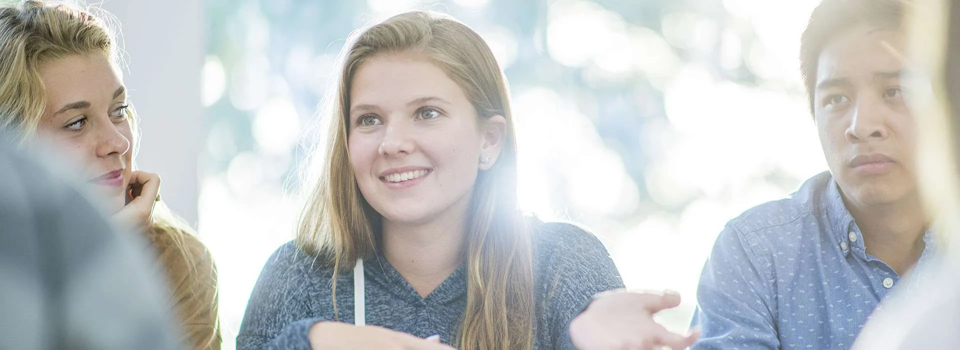 students chatting and smiling