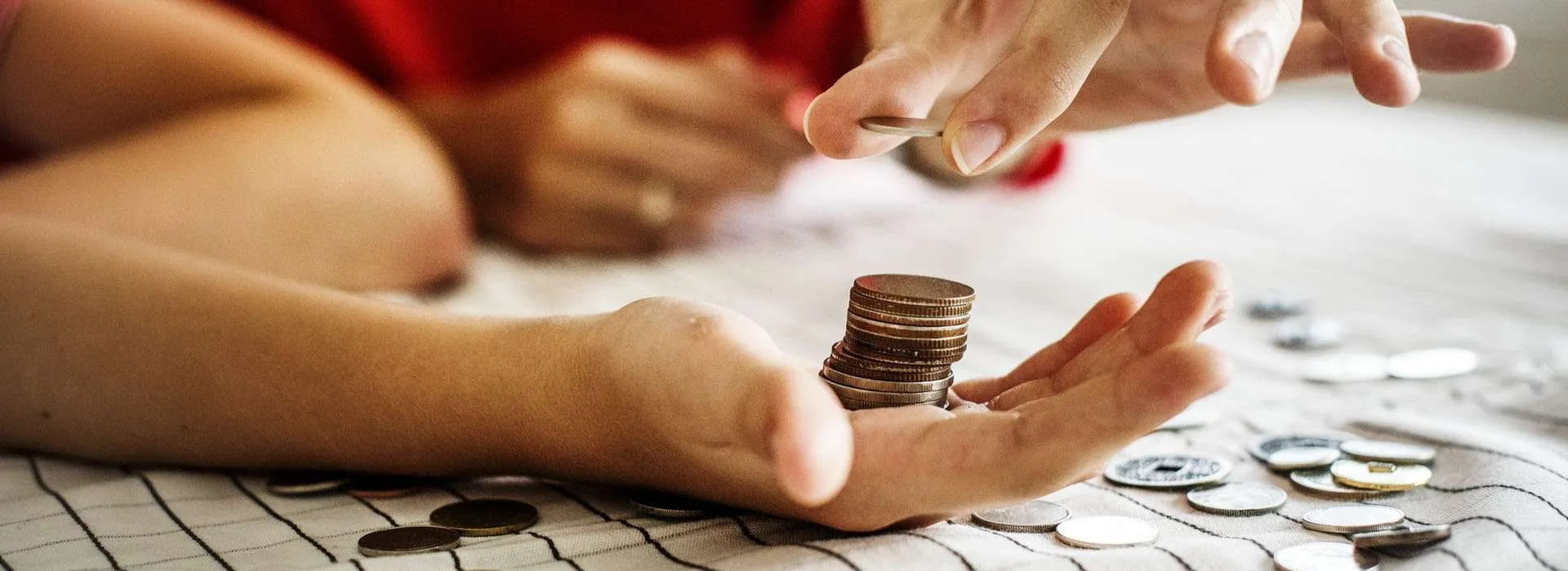 someone's hands counting money