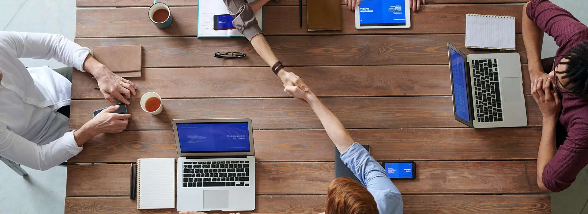 people working round a table
