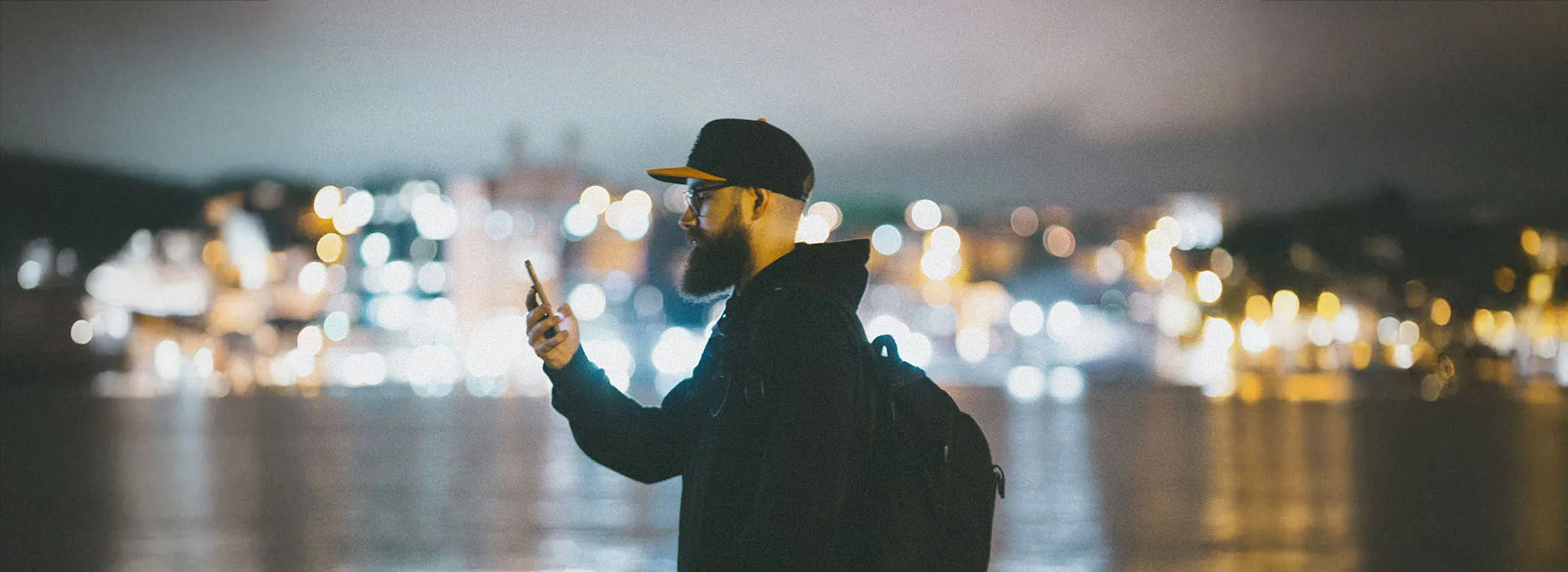 Person holding a mobile phone