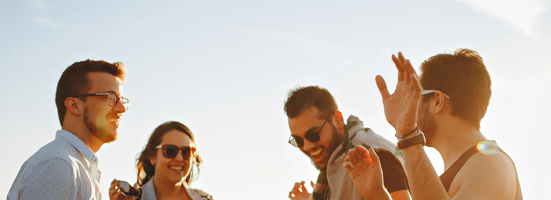 People talking with sunlight behind them