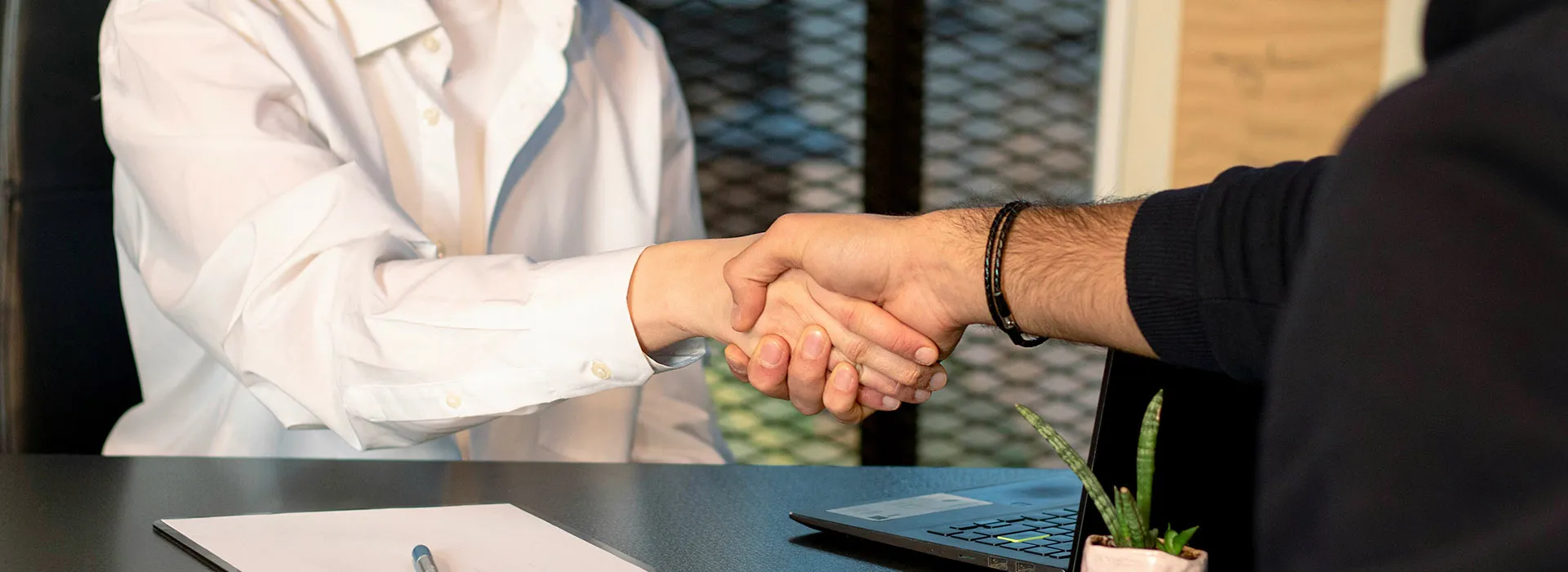 two people shaking hands