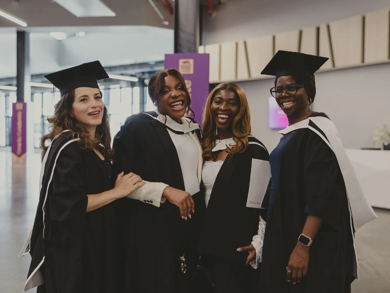 Students celebrating at RGU graduation ceremony