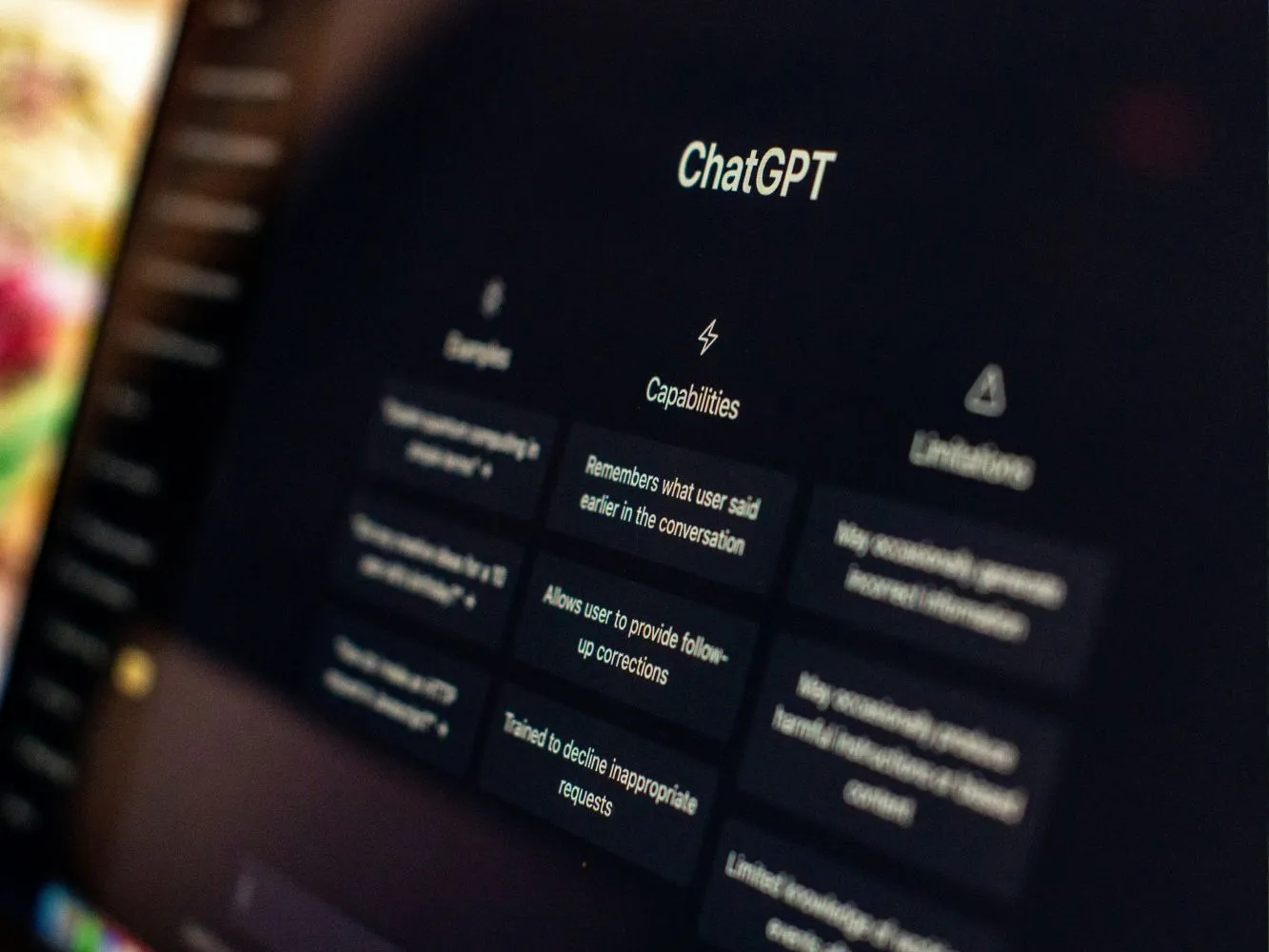 A laptop screen with a black screen with ChatGPT on it