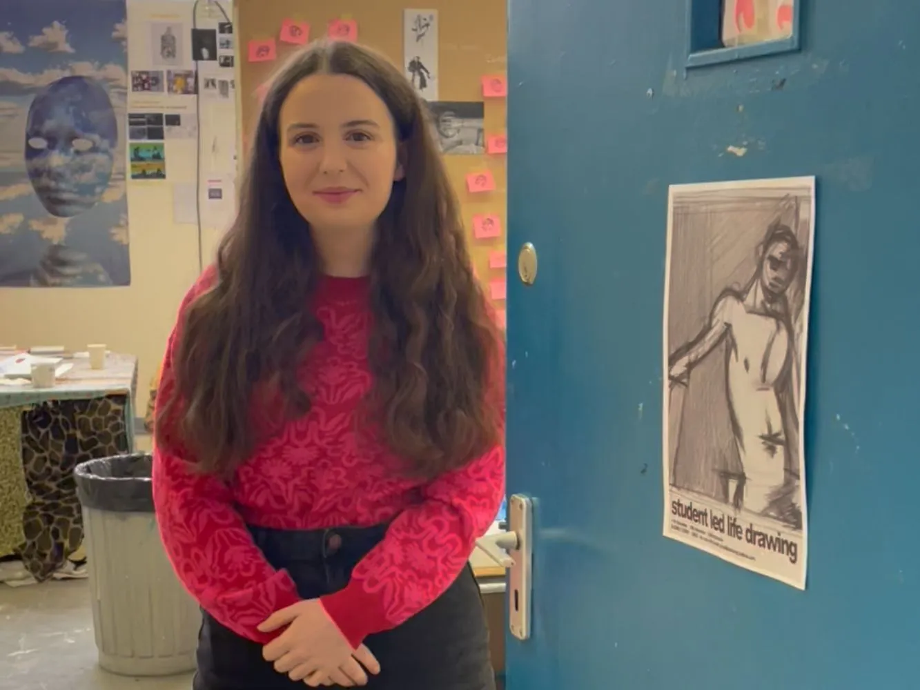 Miriam Foy stands by artwork