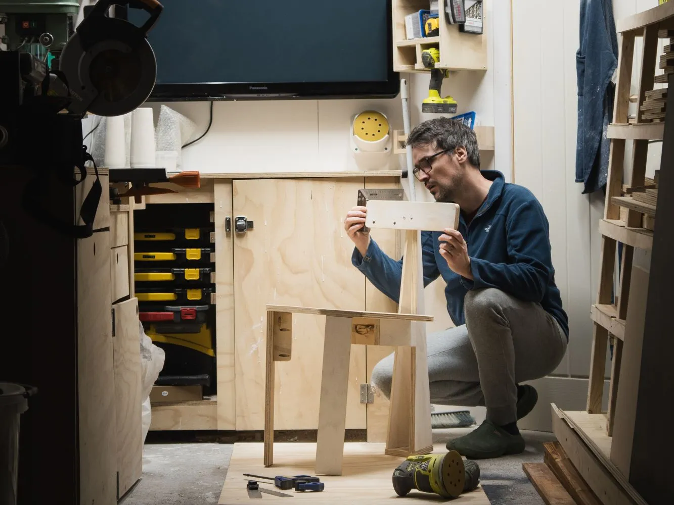 Ben Durack working on his chair design in a small workshop
