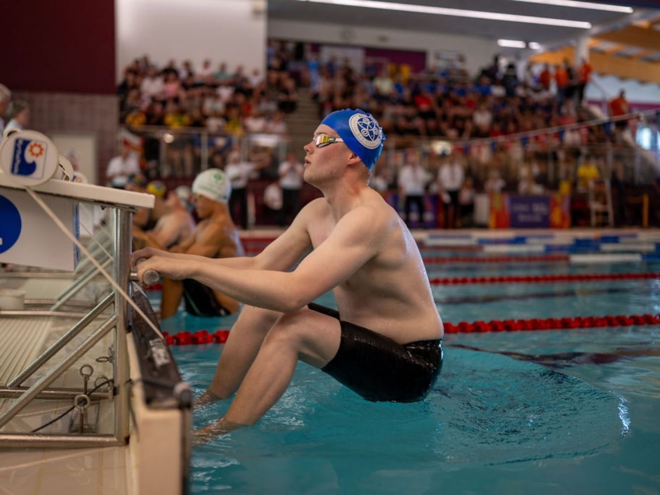 Swimmers at the start of a race