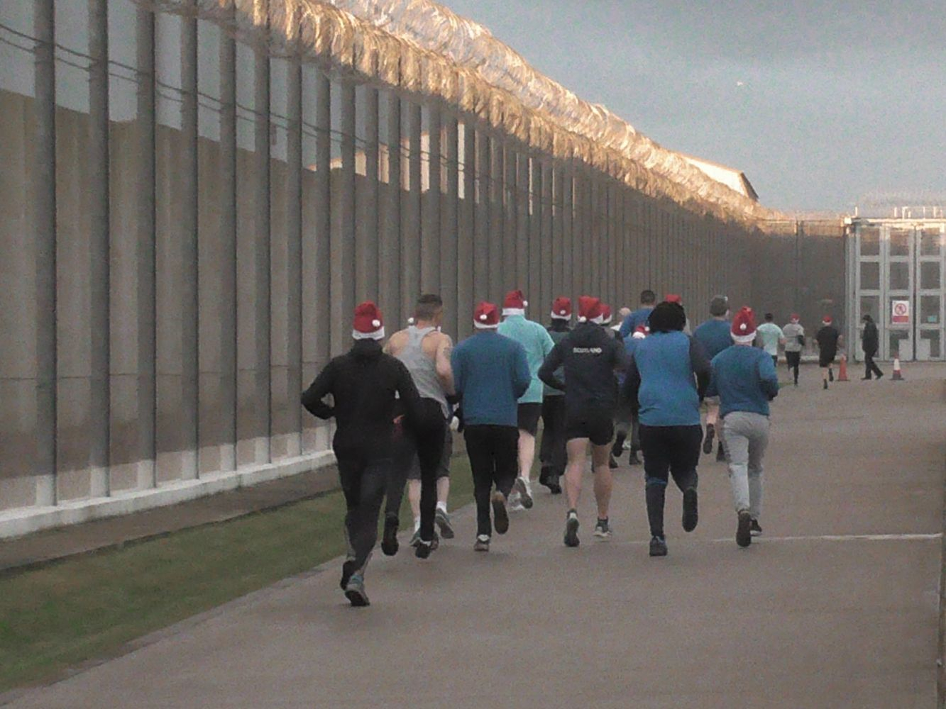 Runners in Santa hats in HMP Grampian