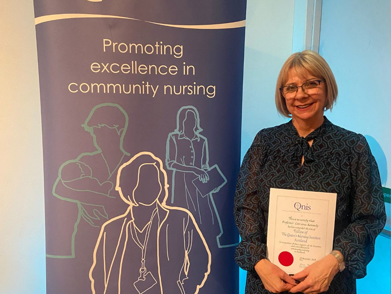 Professor Catriona Kennedy with her award