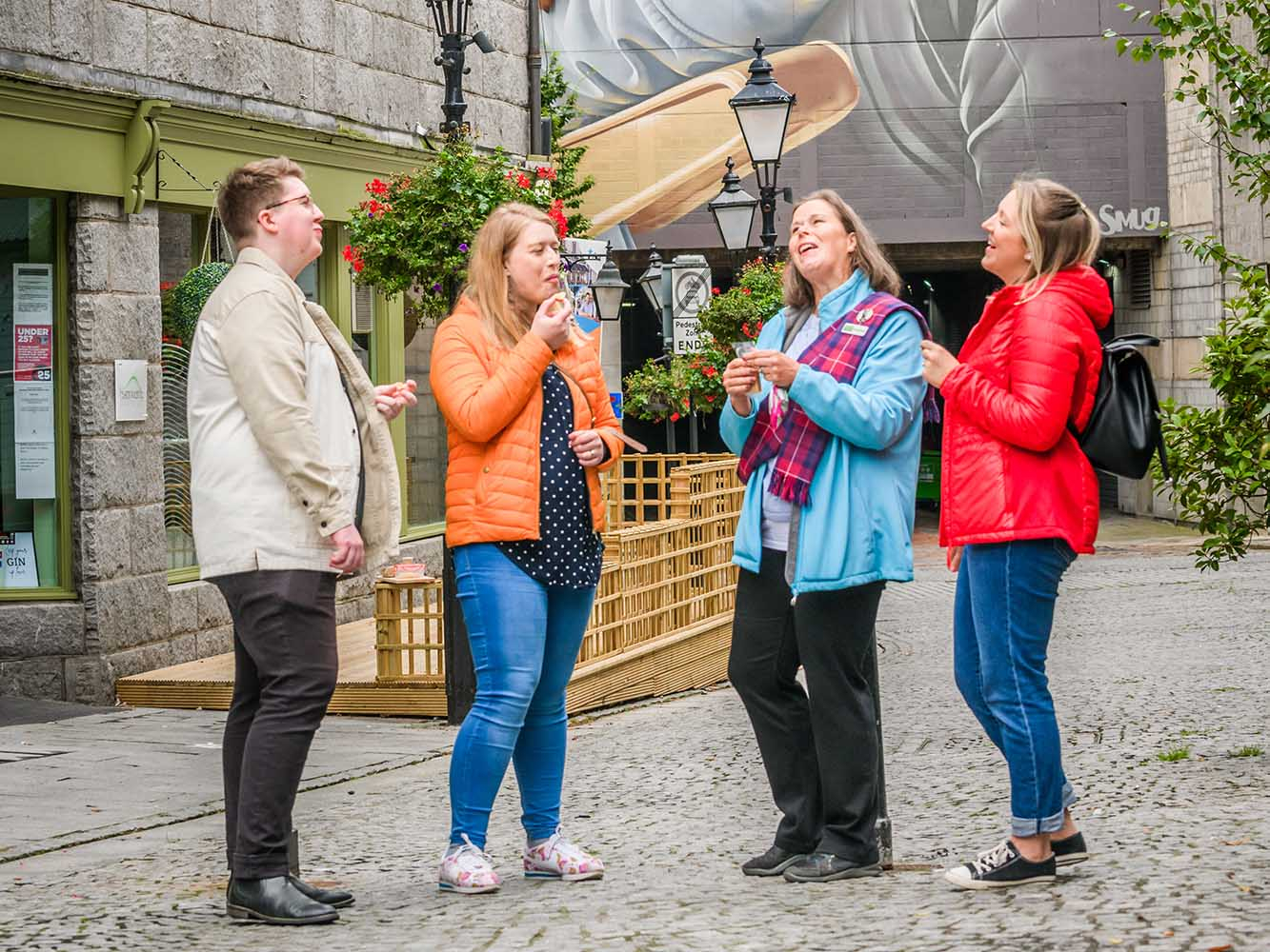 Group enjoy food on Aberdeen's The Green