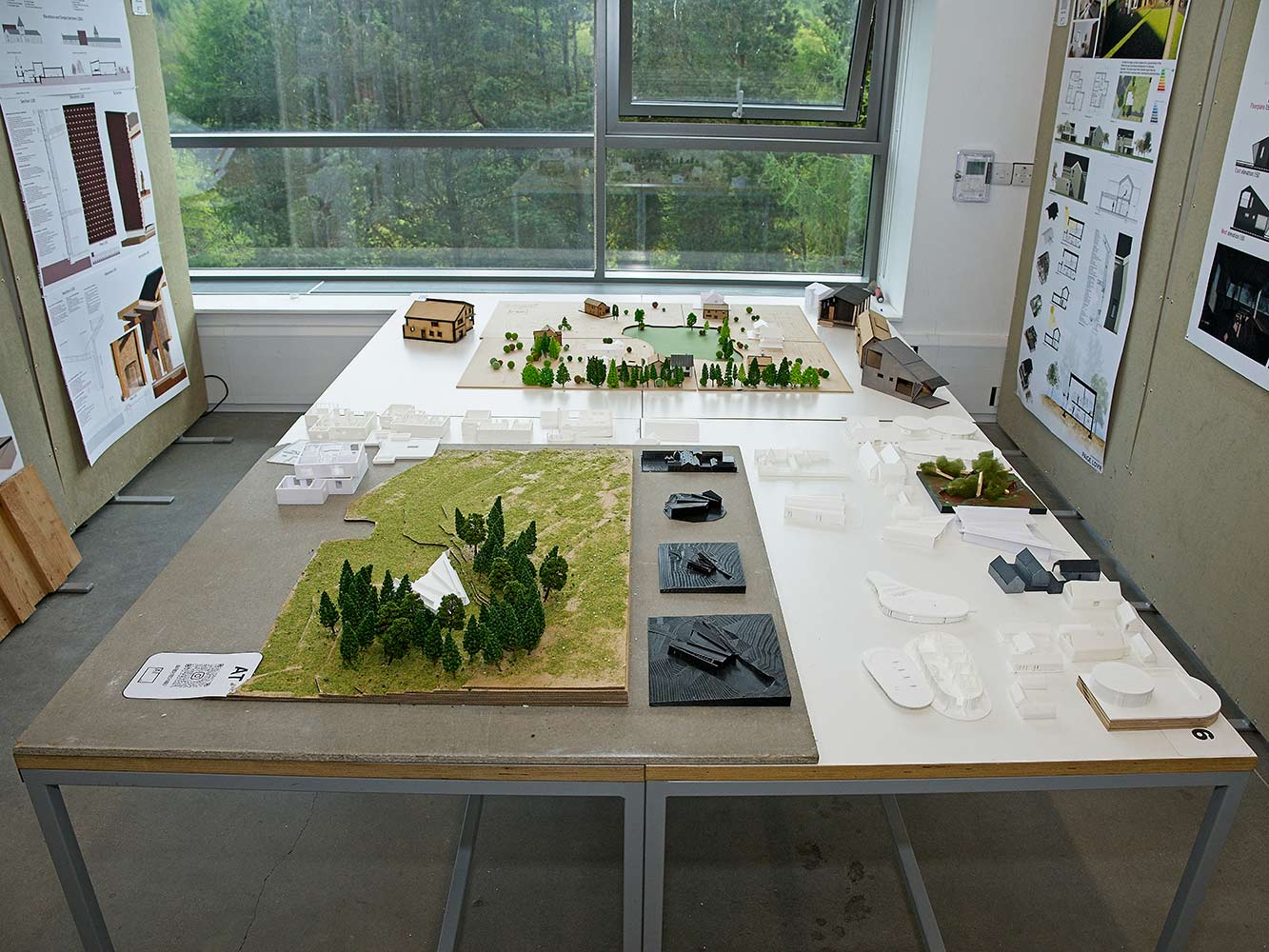 architectural model with trees on a table