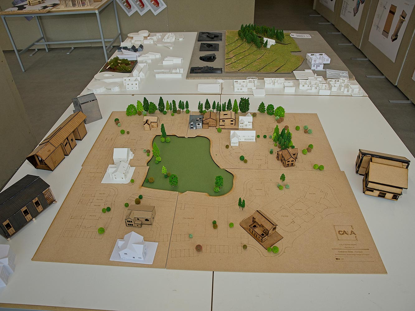 architectural model with trees on a table
