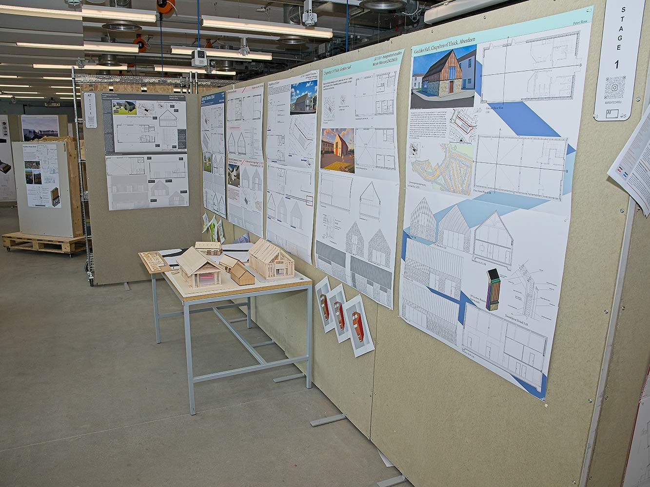architectural drawings on a display board
