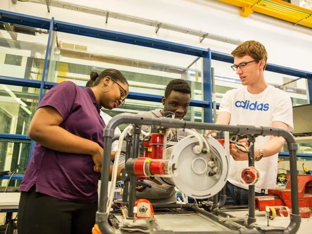 students working on an ROV