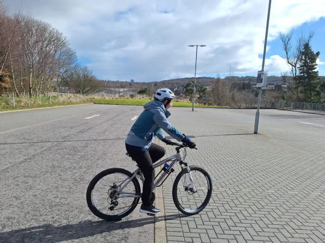 Xiaoli on a bike