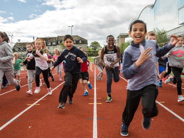 kids running on a track