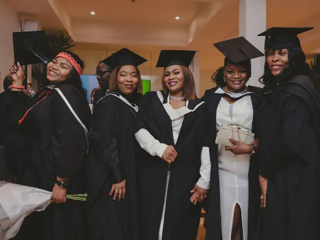 5 graduates pose for photo P&J Live