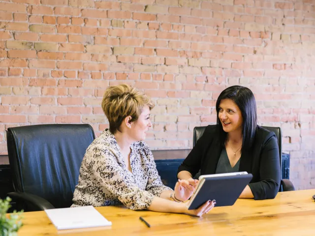 two women having a business meeting