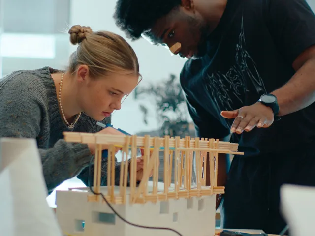 two people working on project
