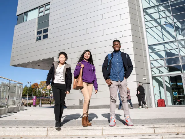 students walking beside the sir ian wood building on rgu campus