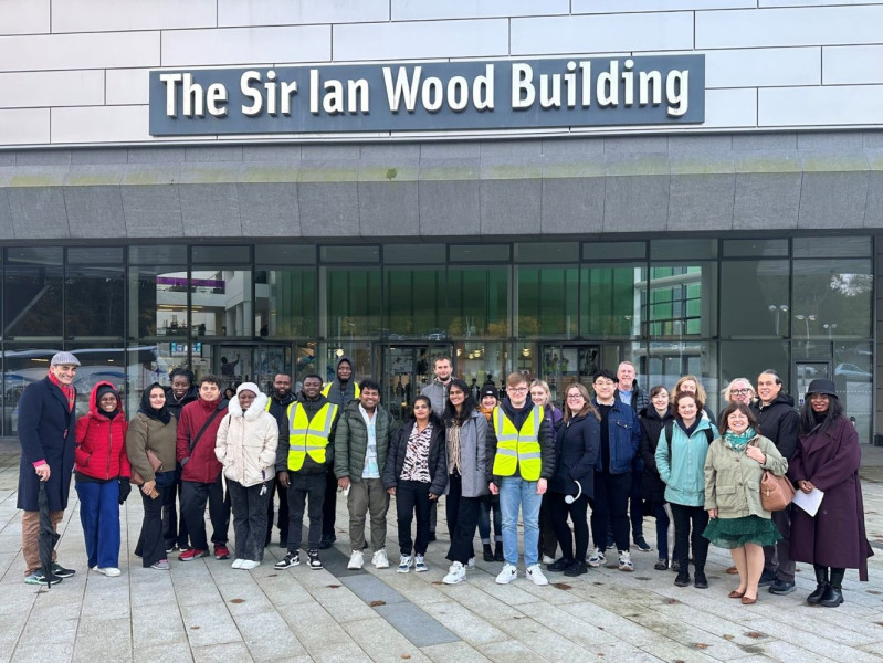 Attendees ready to walk gather at SIWB, RGU