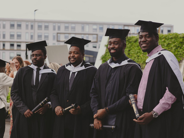 Graduates pose outside P&J Live