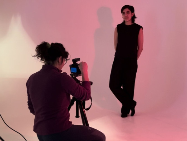 Communication Design student Camilla des Angelis taking a photography of a model