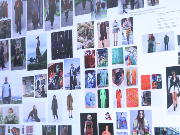 Image shows digital screen with fashion images