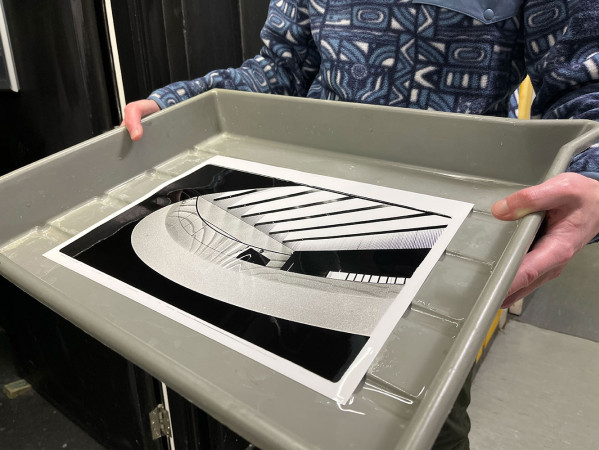 Photo in a developing tray