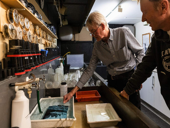 students learning how to develop camera film