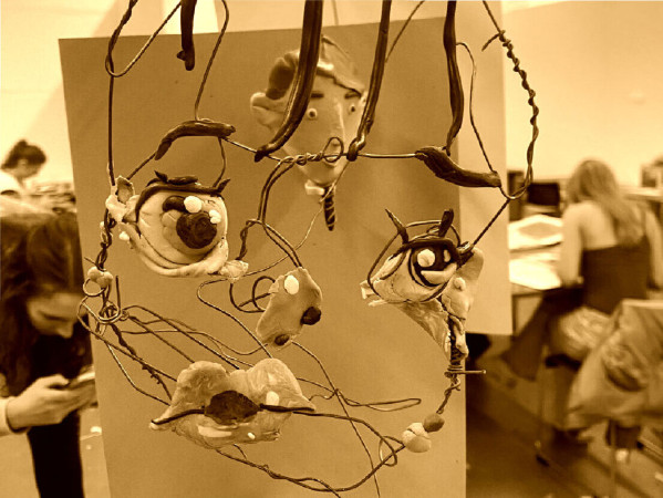 Sepia toned image of a wire sculpture of a face Sepia toned image of a wire sculpture of a face