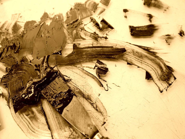 Sepia toned image of a smudge of ink or paint Sepia toned image of a smudge of ink or paint