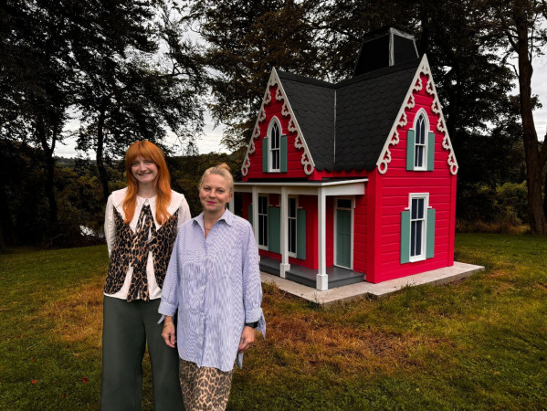 Image shows Sally and Claire Bruce from Look Again with 'A House in the Woods' sculpture