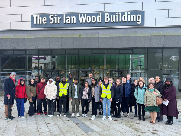 Attendees ready to walk gather at SIWB, RGU