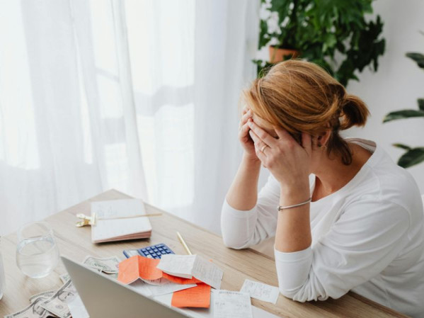 Woman stressing over finances