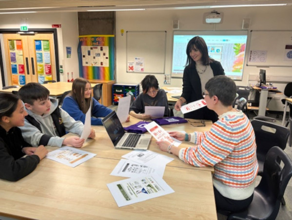 Dr Dina Martzoukou with a group of school pupils. Dr Dina Martzoukou with a group of school pupils.