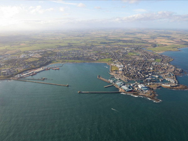 An overhead shot of Peterhead Port with the town behind