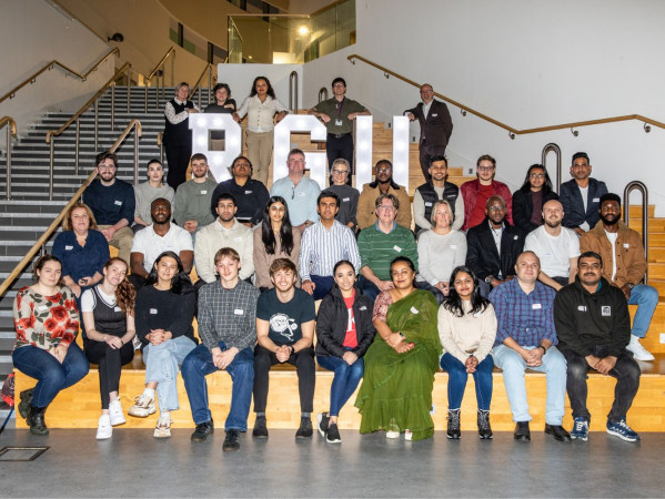 The Startup Accelerator 2025 cohort in the back atrium of SIWB