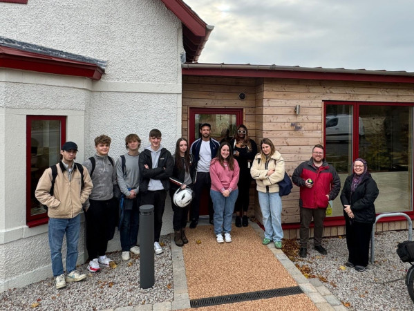 Students and staff gather at the new Murtle Market building