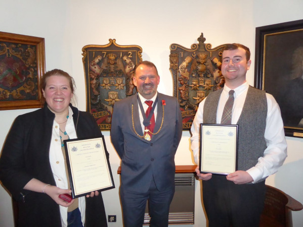 Image shows Joanna Robertson (Winner) and Iain Gillies (Runner up)  both holding their Award Certificates and Joanna the J Gray Kilgour Medal with Deacon Martin Wiseman, Aberdeen Weaver's Incorporation Awards.